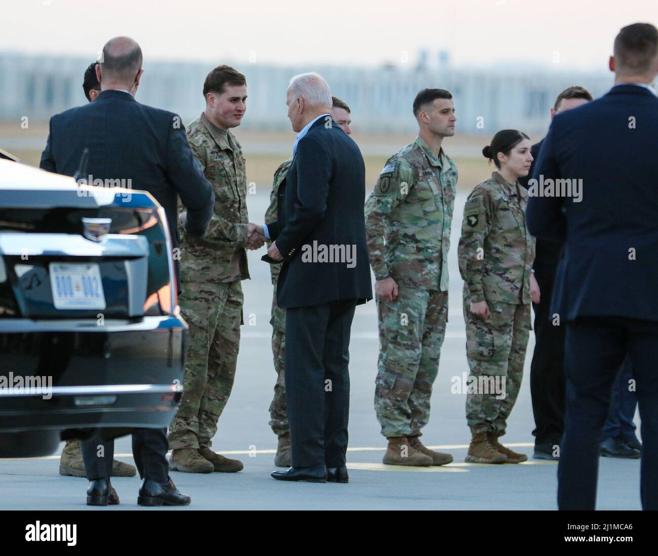 U.S. President Joseph R. Biden Jr. and other senior officials greet Soldiers on the tarmac at Rzeszow-Jasionka Airport, Poland, on March 25, 2022. The President, Secretary of Defense Lloyd Austin, and other officials visited troops who are currently deployed to Poland in support of our NATO Allies. (U.S. Army photo by Sgt. Catessa Palone) Stock Photo