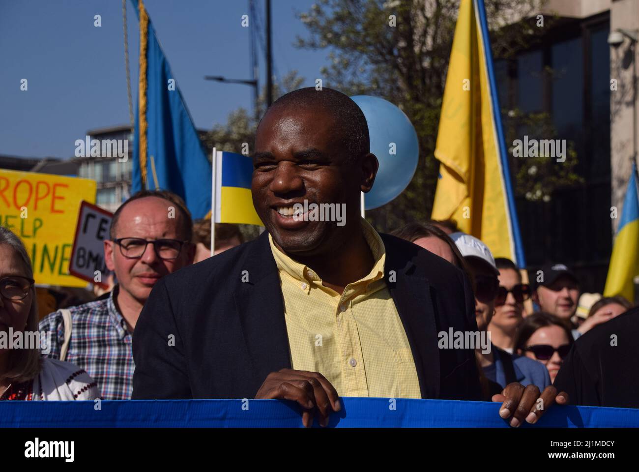 London, UK. 26th March 2022. Labour MP David Lammy with protesters in Park Lane during the London Stands With Ukraine march. Thousands of people marched from Park Lane to Trafalgar Square in solidarity with Ukraine as Russia continues its attack. Credit: Vuk Valcic/Alamy Live News Stock Photo