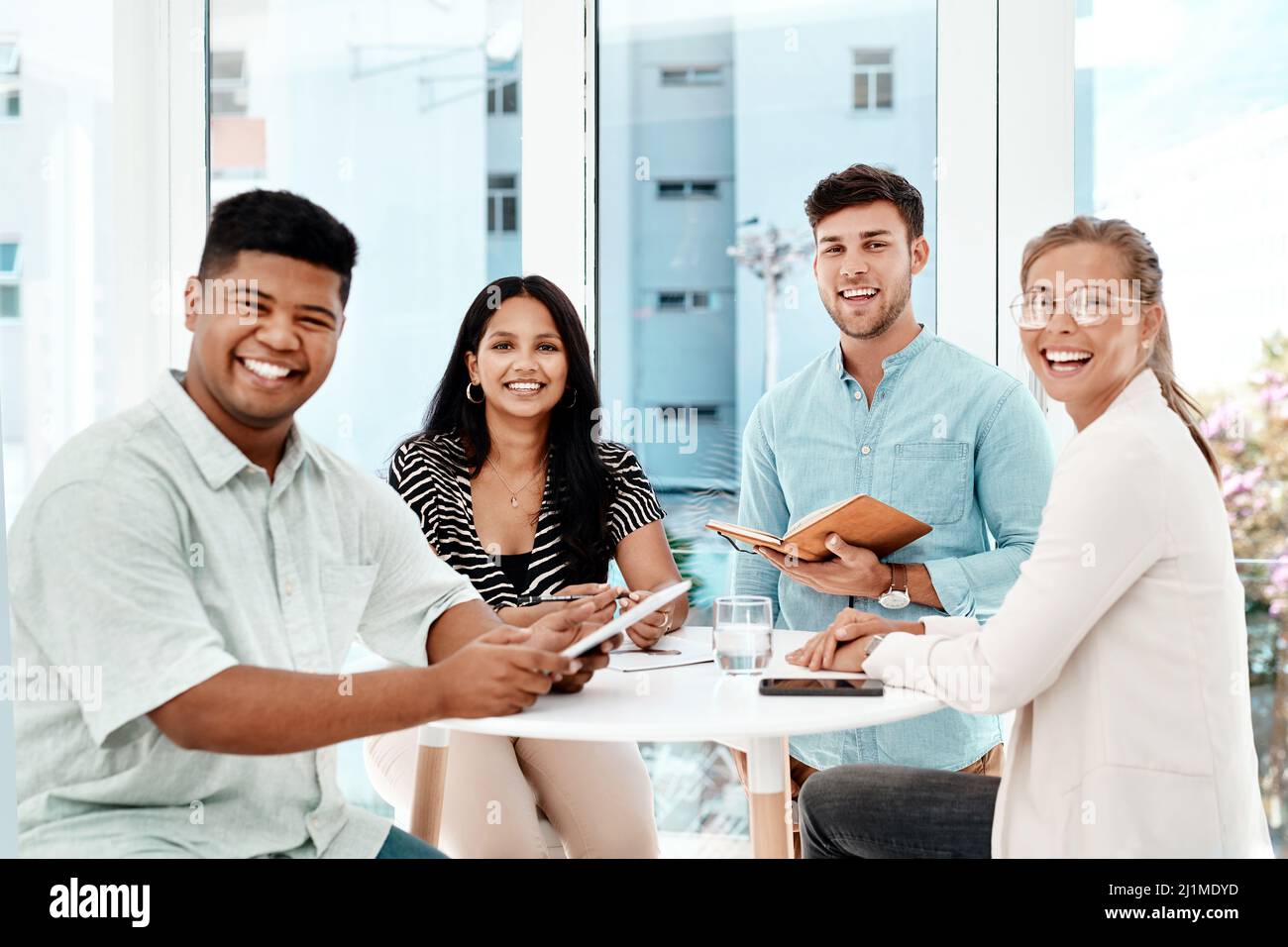 Were the team you need. Cropped portrait of a group of young business ...