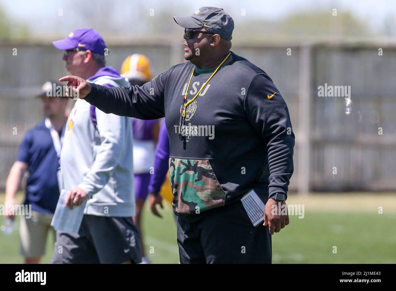 Baton Rouge, LA, USA. 26th Mar, 2022. LSU Offensive Line coach Brad Davis  corrects a mistake his players made during the first week of spring football  practice at the LSU Charles McClendon