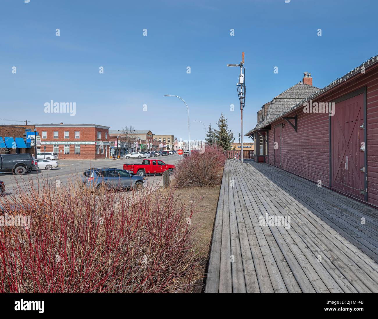 Didsbury, Alberta, Canada – March 25, 2022:  View of the main downtown street as seen from the historic train station now housing the Chamber of Comme Stock Photo