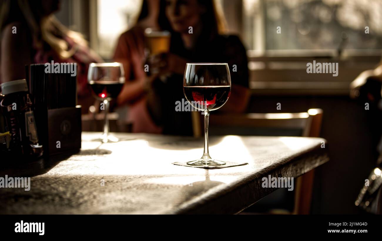 Half full red wine glass hi-res stock photography and images - Alamy