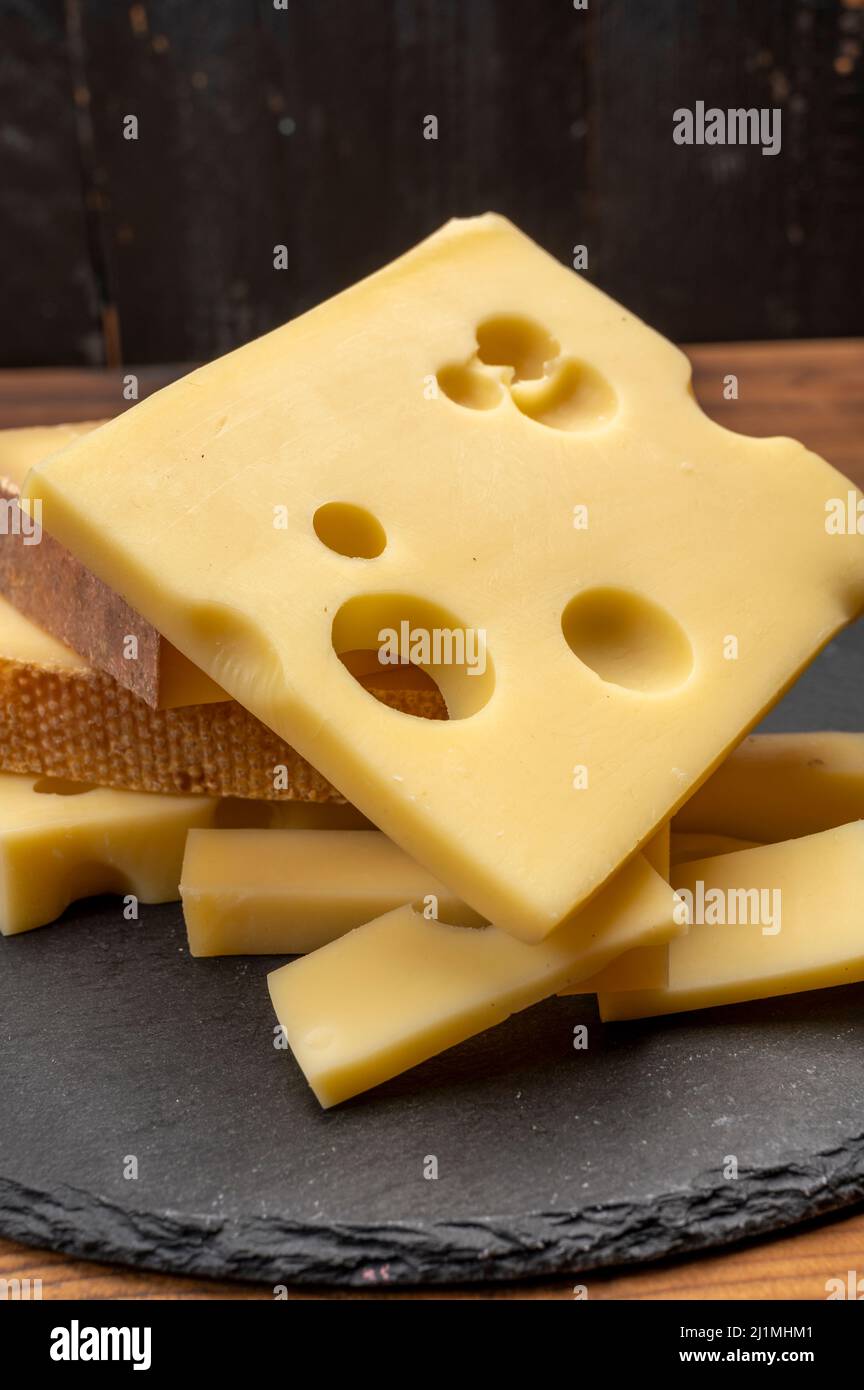 Swiss cheese collection, emmentaler with holes, gruyere, appenzeller ...