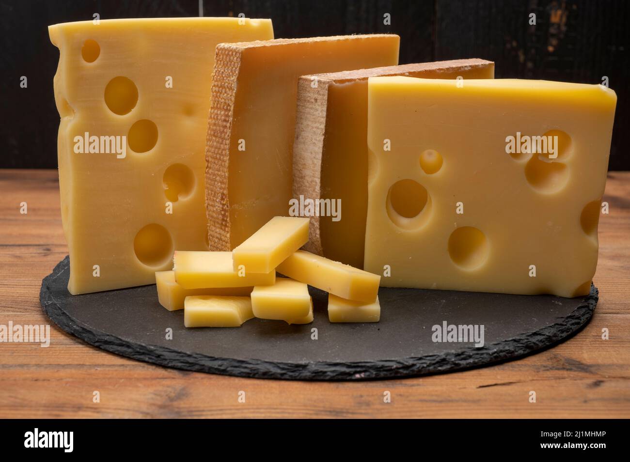 Swiss cheese collection, emmentaler with holes, gruyere, appenzeller ...