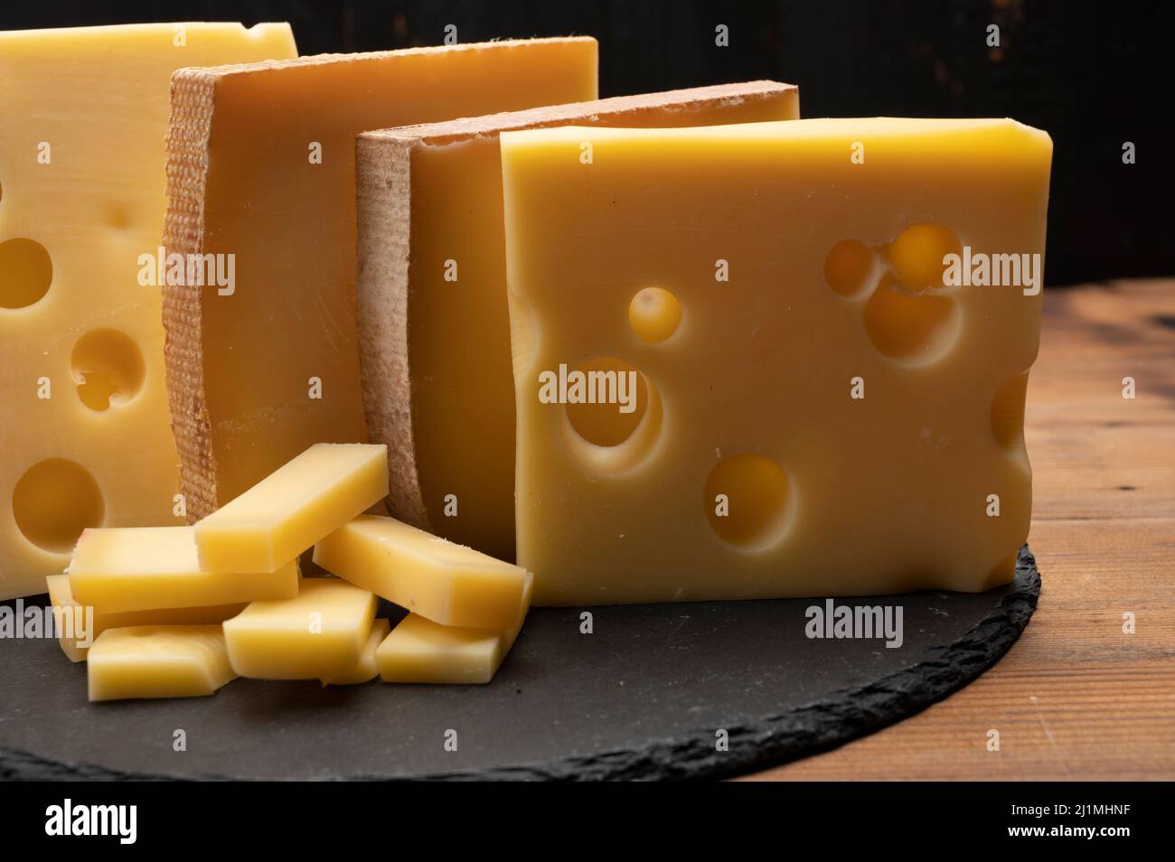 Swiss cheese collection, emmentaler with holes, gruyere, appenzeller ...
