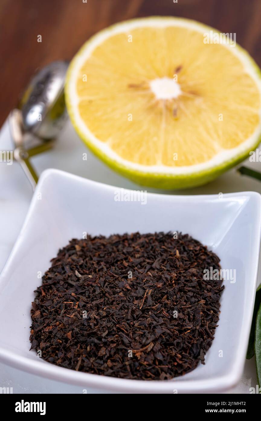 Making of tasty aromatic earlgray tea with fresh ripe bergamot citrus