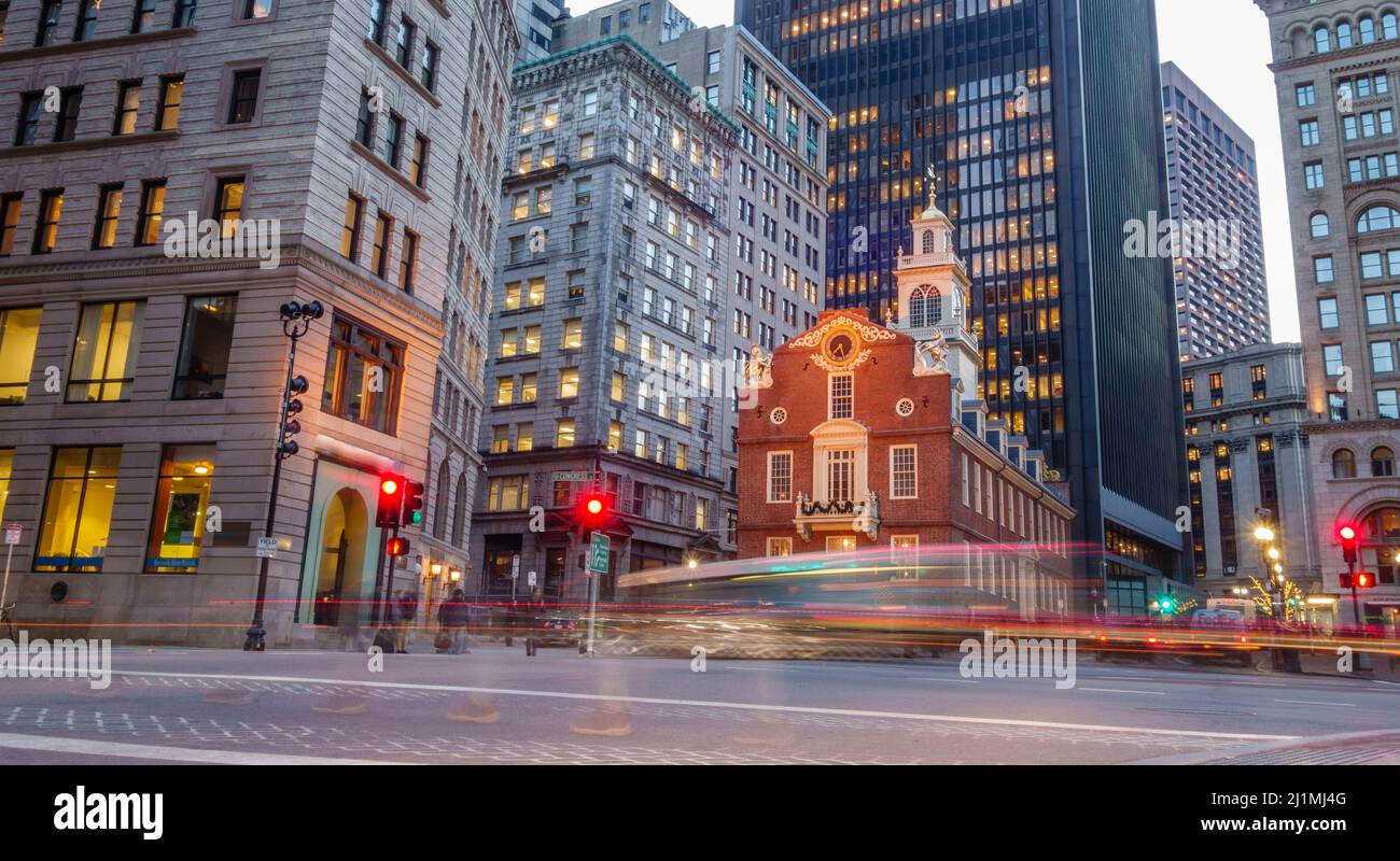 BOSTON, MA, USA – DECEMBER 21, 2016:  Rush hour traffic near the historic Old State House in Boston's Financial District. Stock Photo