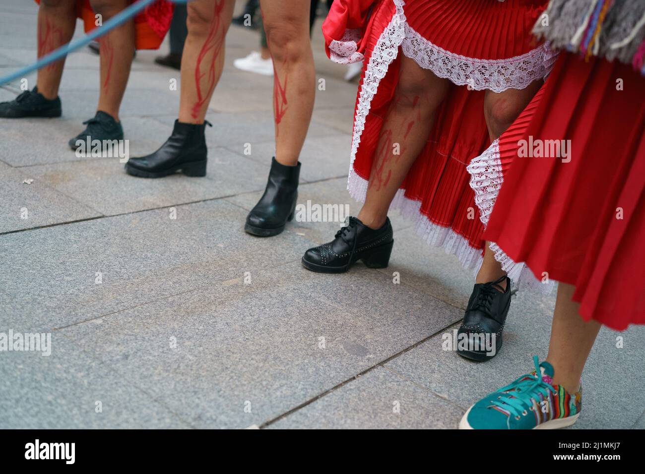 Madrid, Spain. 26th Mar, 2022. Women with their legs painted to simulate blood represents an abortion during the demonstration. Protest for the decision of the Constitutional Court of Peru to release Alberto Fujimori, in the Plaza de Callao in Madrid. Peru's constitutional court on March 17th ordered the release of Fujimori, who is serving a 25-year sentence for crimes against humanity. (Photo by Atilano Garcia/SOPA Images/Sipa USA) Credit: Sipa USA/Alamy Live News Stock Photo