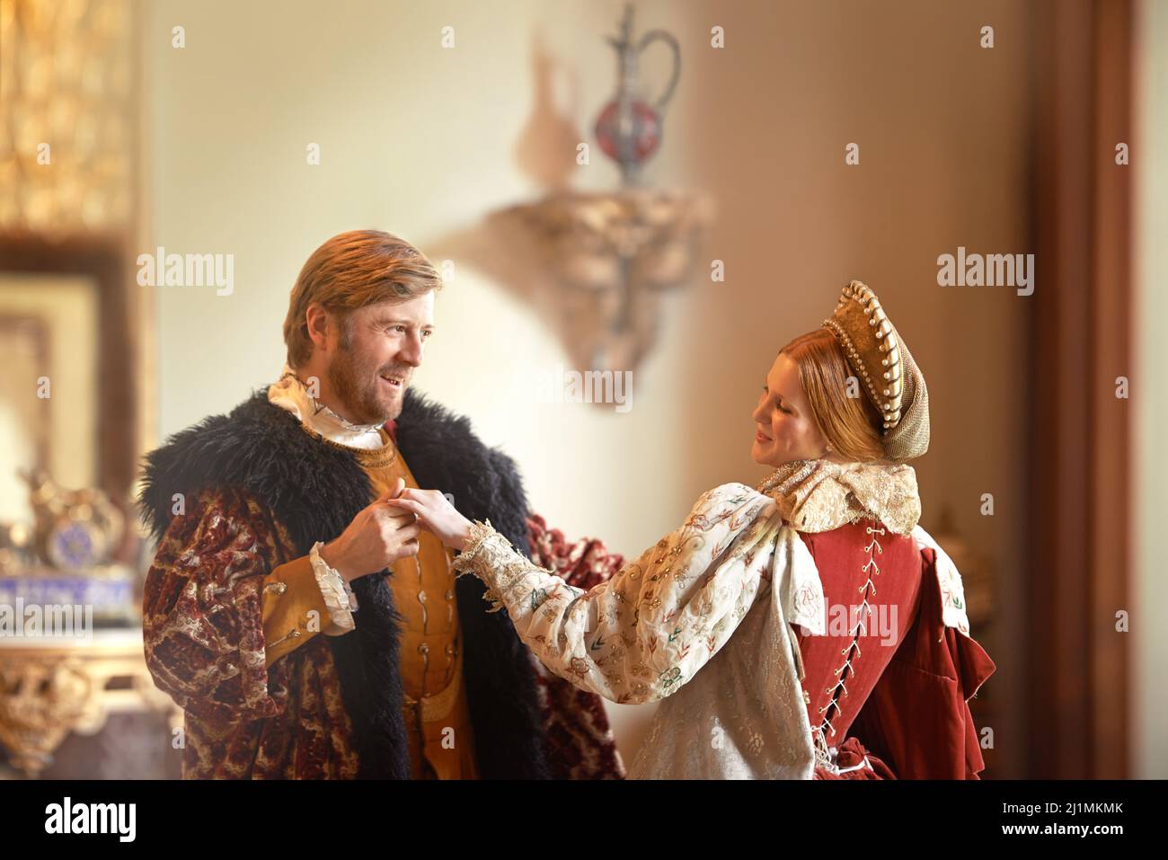 Dance Royale. A king and queen dancing together in their palace. Stock Photo