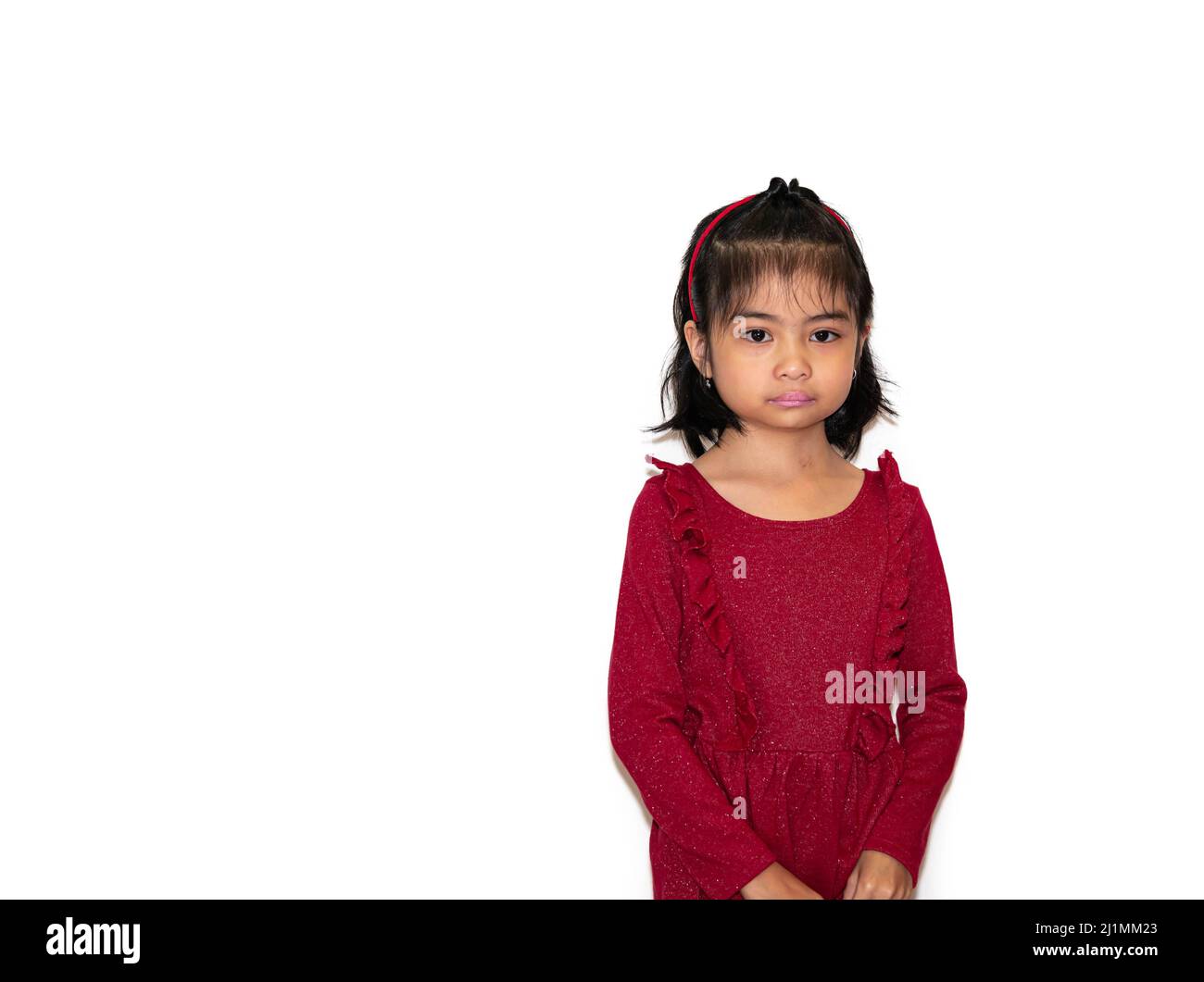 sad offended bullied asian girl cries Stock Photo