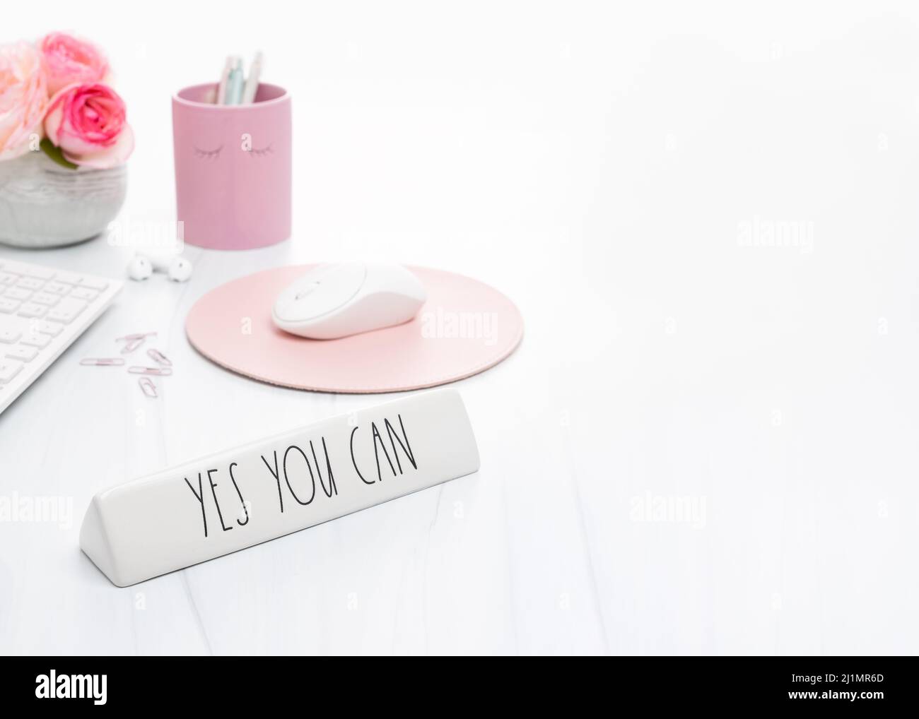 Feminine Styled Desktop with Encouraging Message Stock Photo