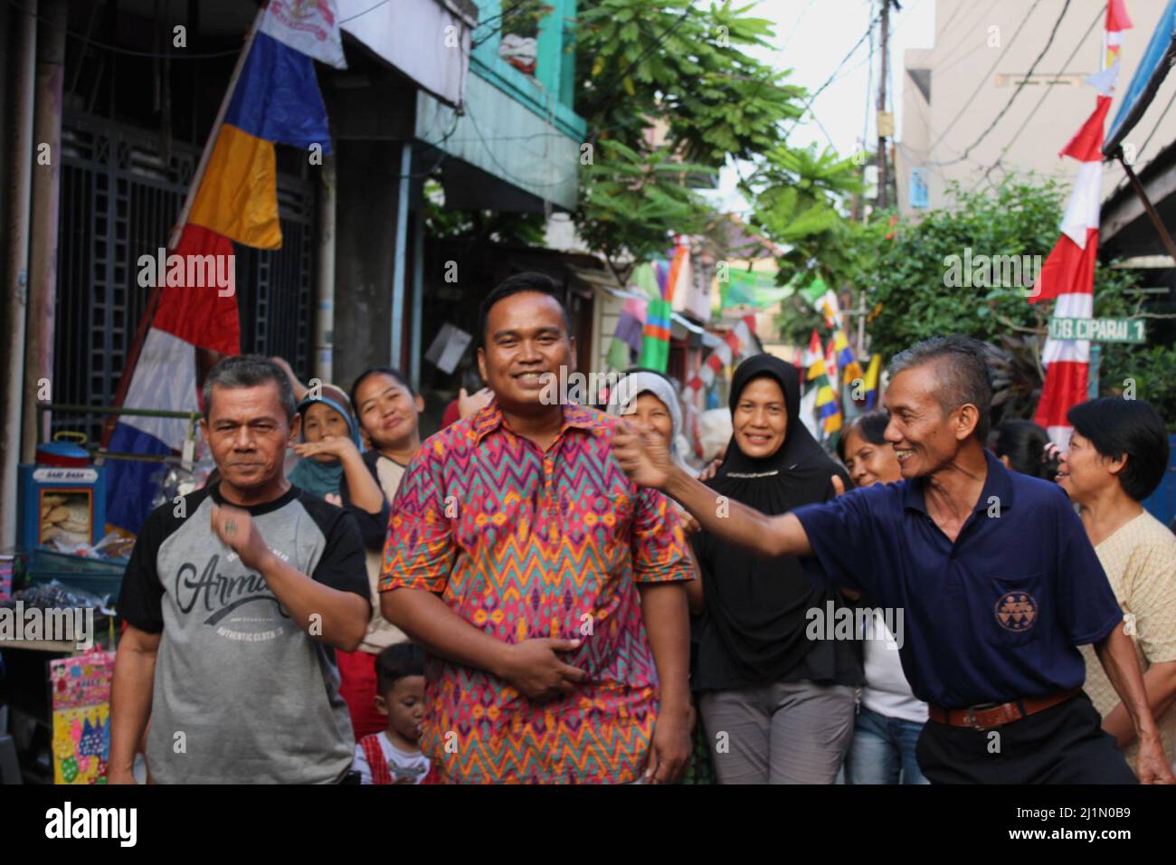 Jakarta, Indonesia - 08 17 2018: gentlemen who look happy when they will participate in the competition to celebrate the 72nd Indonesian Independence Stock Photo