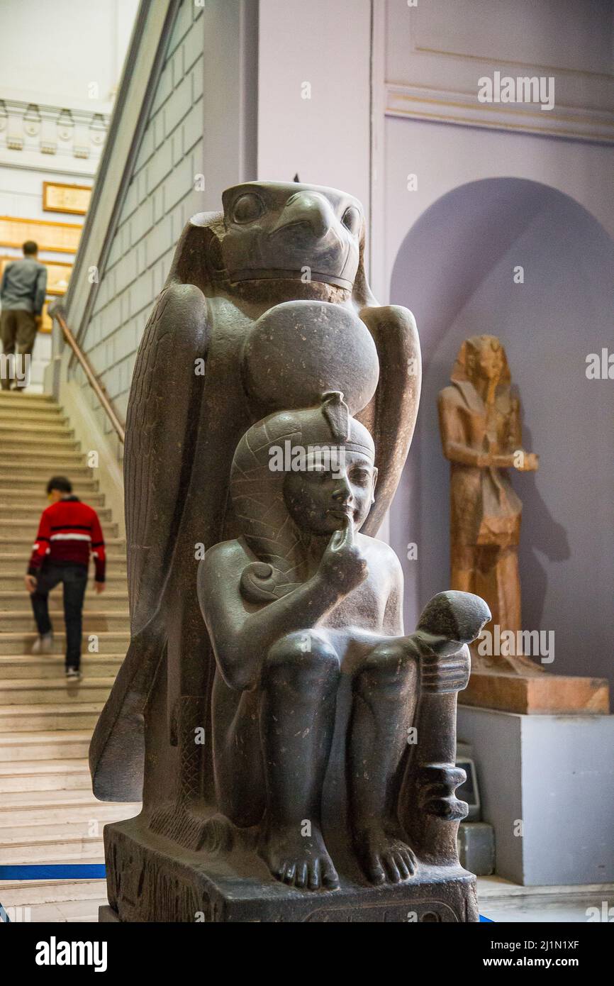 Cairo, Egyptian Museum, Ramses 2 as a child, protected by the hawk god Horoun. Granite, from Tanis. Cryptographic name of the king : Ra Mess Sou. Stock Photo