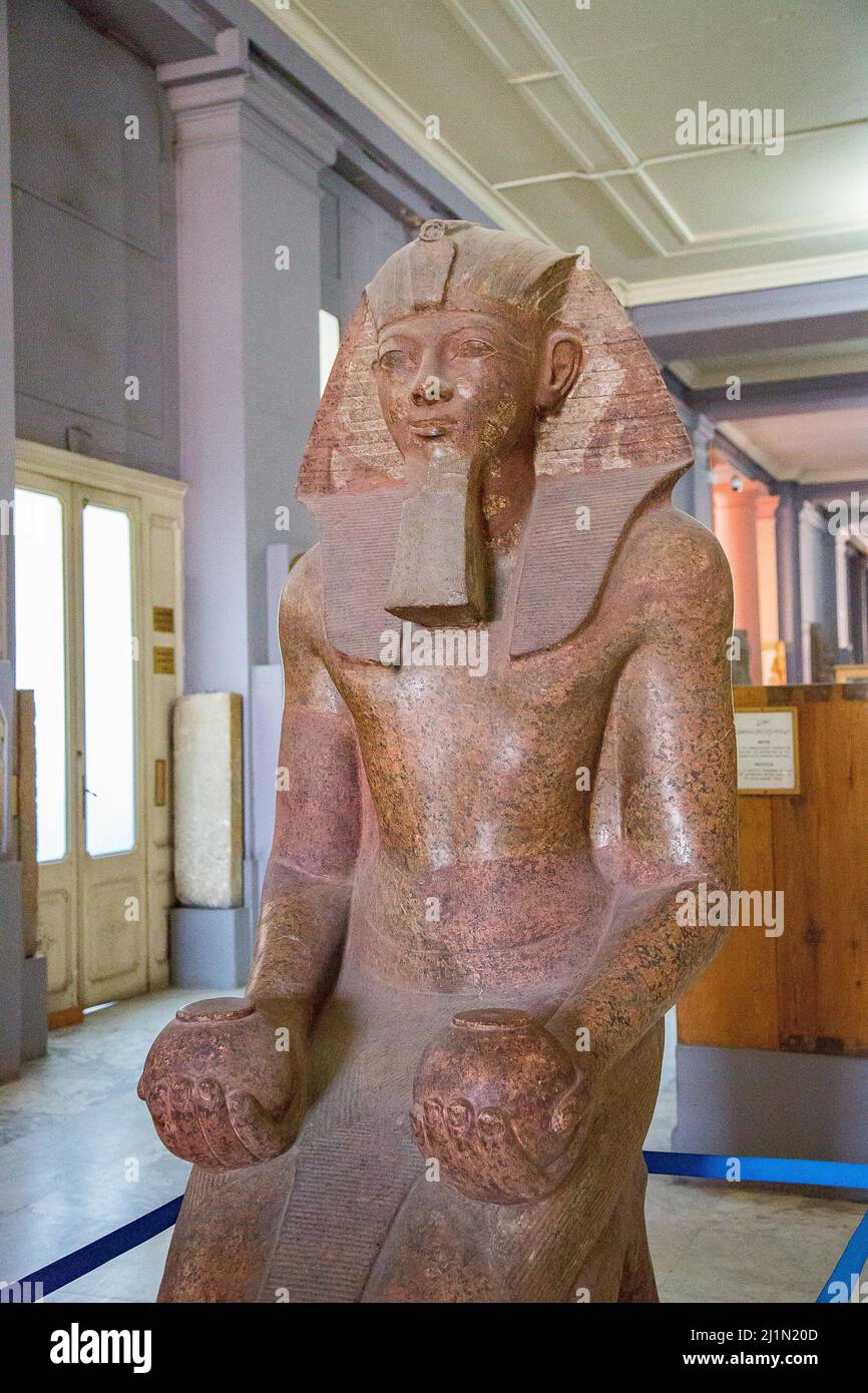 Cairo, Egyptian Museum, kneeling statue of Hatshepsut, one of the rare women who became king of Egypt. Granite, from her temple in Deir el Bahari. Stock Photo