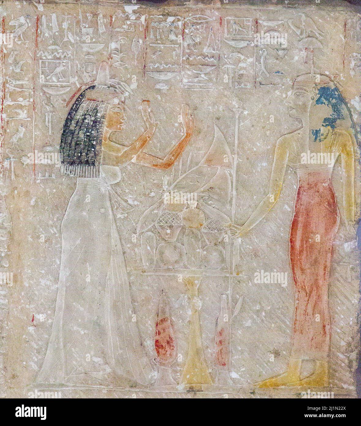 Cairo, Egyptian Museum, relief of Merya and Sitti, found in Saqqara : Sitti adoring Hathor. The block was reused as pavement in another tomb. Stock Photo