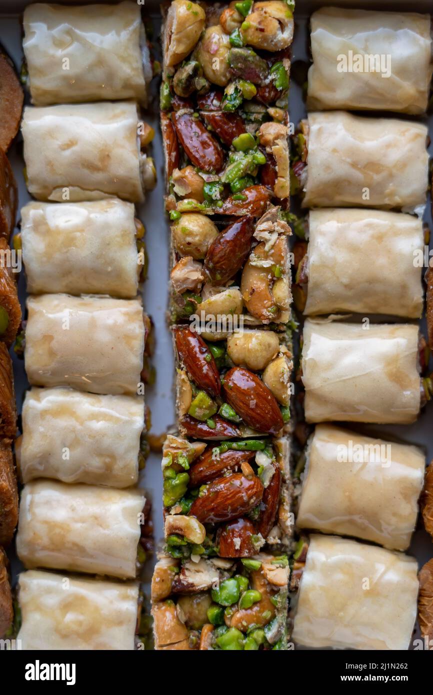 Arabic and Turkish oriental sweets Desserts made of pistachios and kunafa with leafy dough Stock Photo