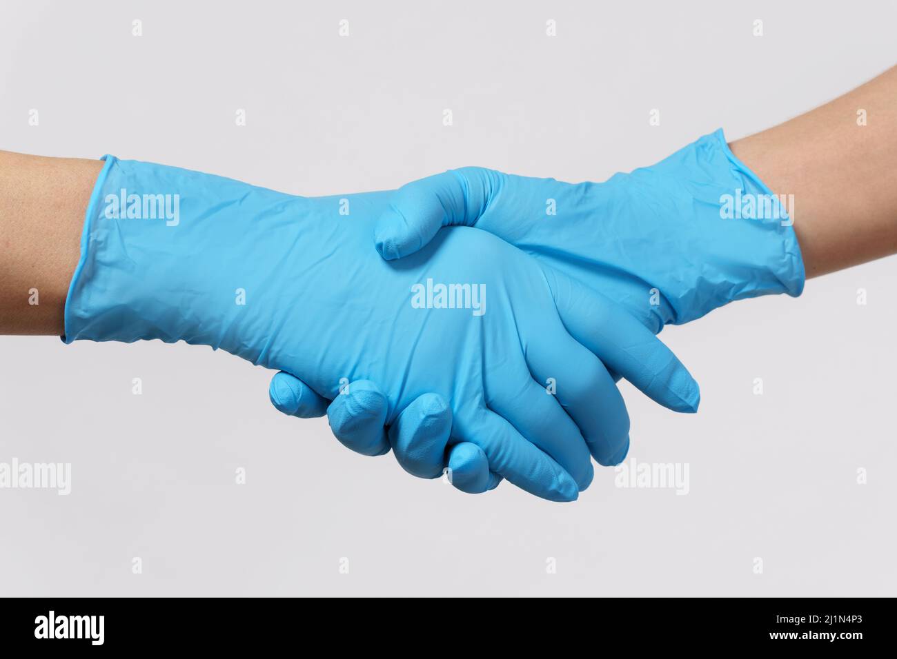 People wearing latex gloves greeting each other Stock Photo Alamy