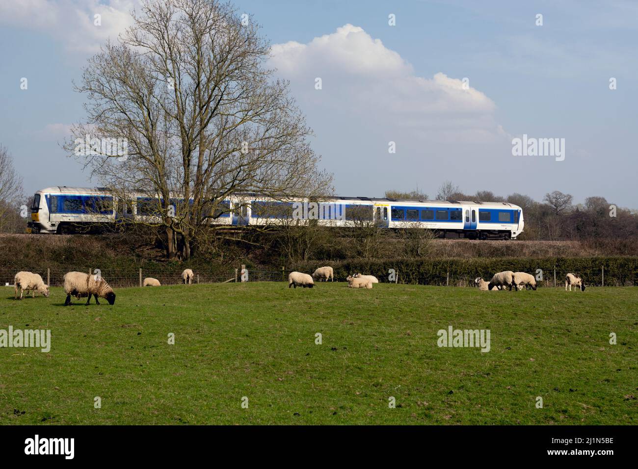 Chiltern Railways train in the countryside, Warwickshire, UK Stock Photo