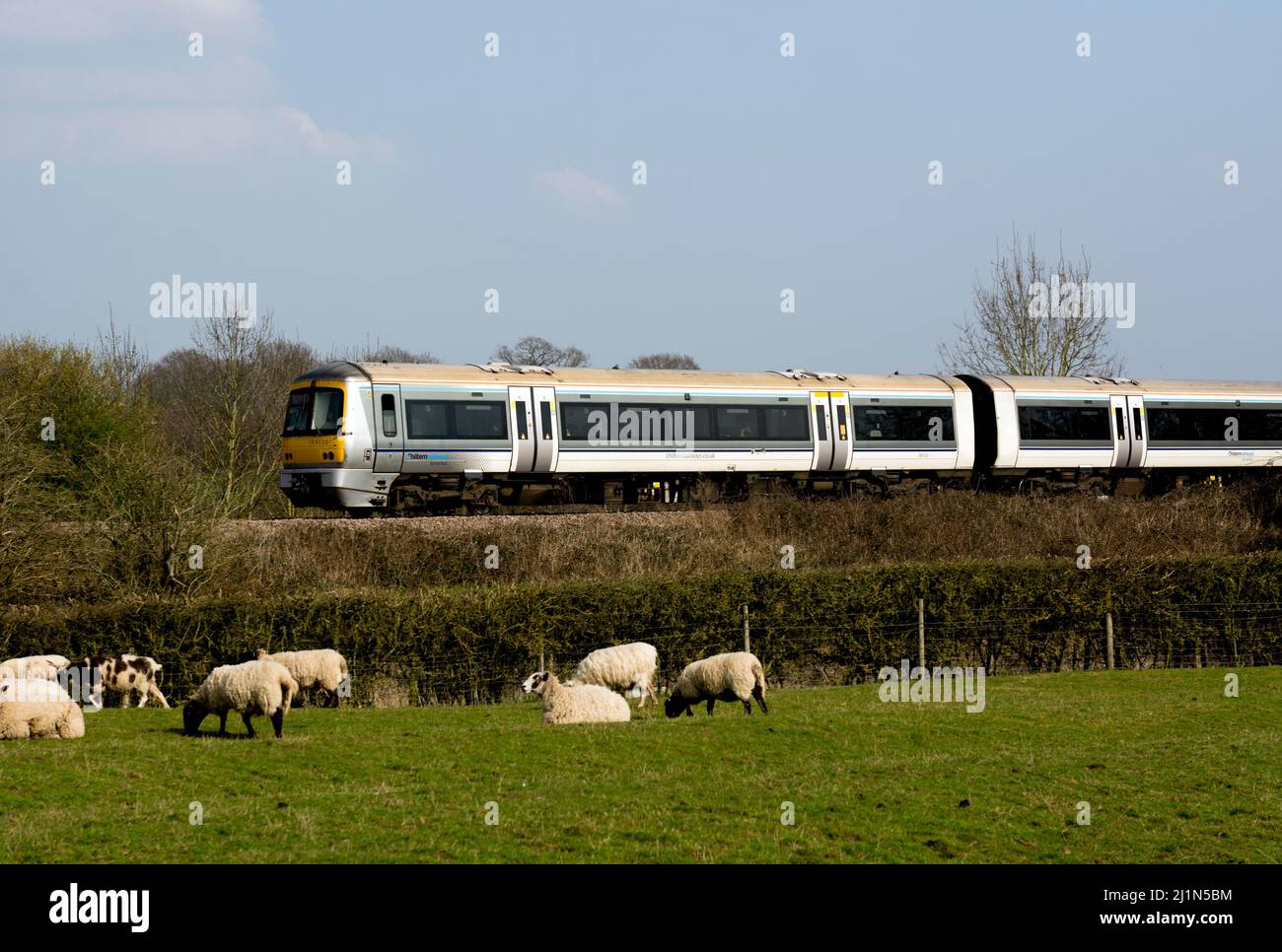 Chiltern Railways train in the countryside, Warwickshire, UK Stock Photo
