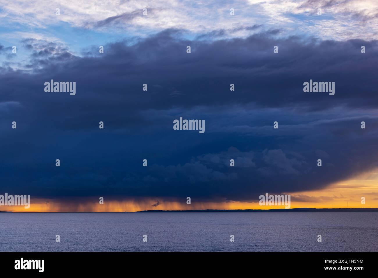 Dark clouds with rain showers Stock Photo Alamy