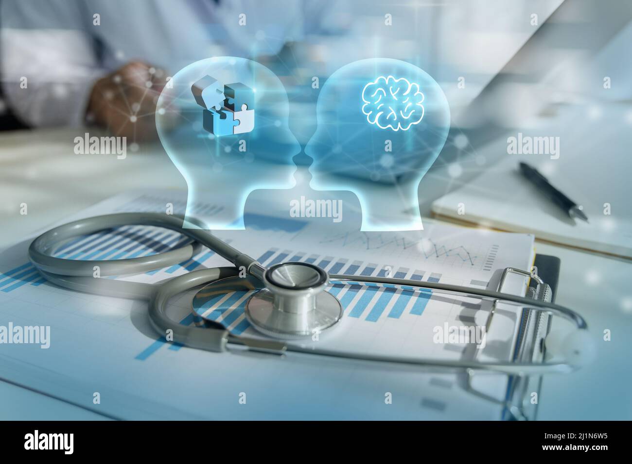 Doctor working mental health day brain jigsaw puzzle pieces of a head