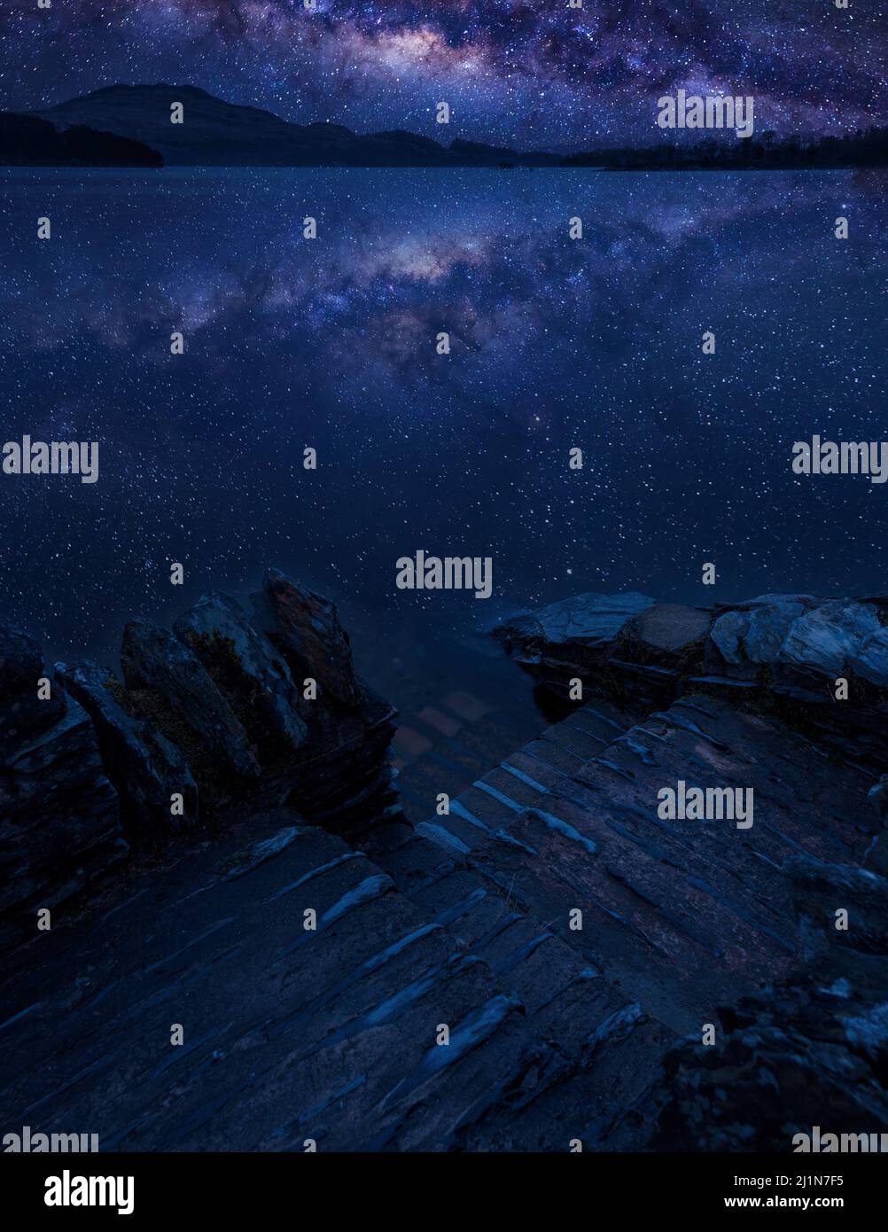 Stunning vibrant Milky Way composite image over landscape of Loch ...