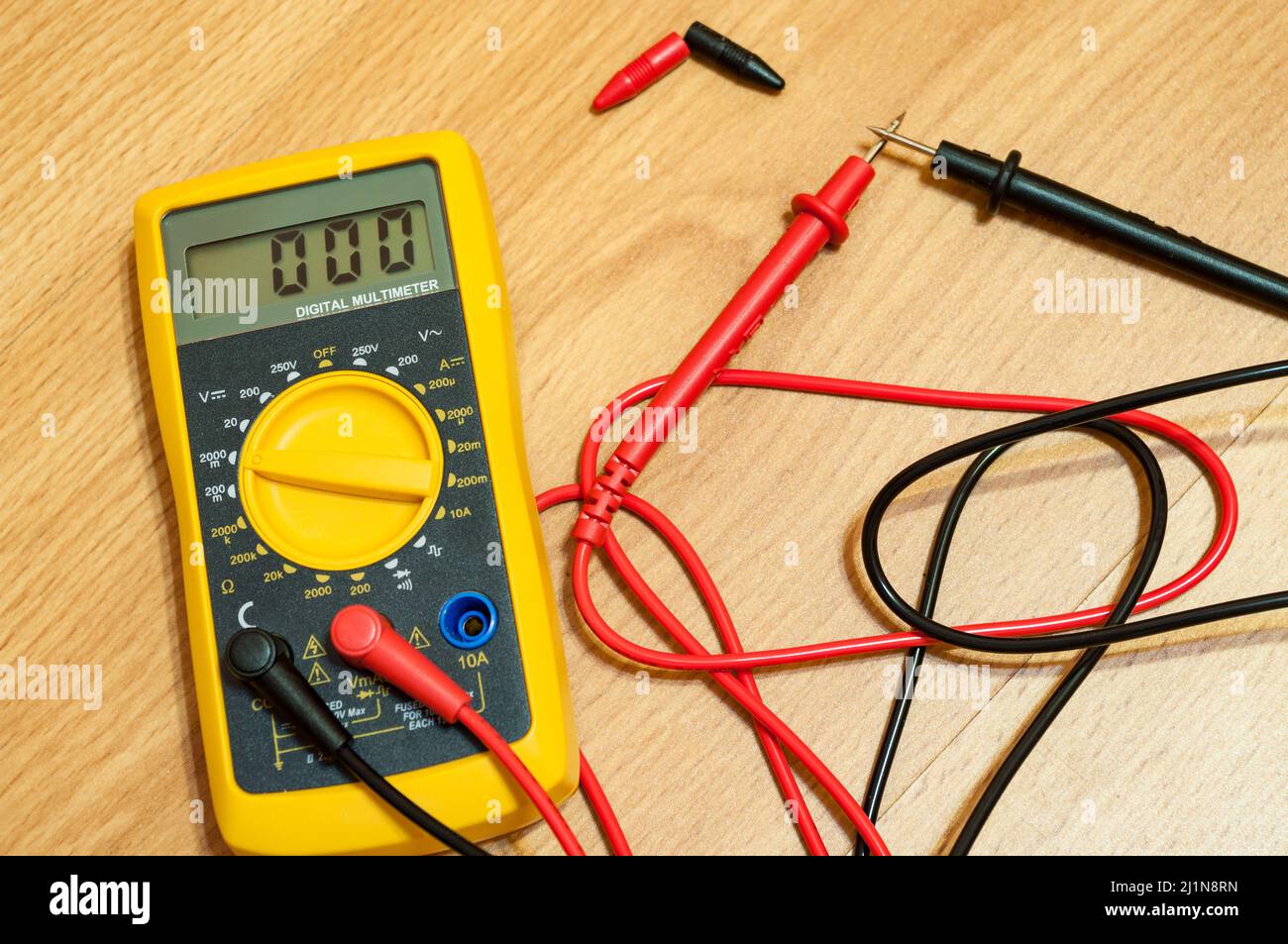 Modern digital multimeter on a floor Stock Photo