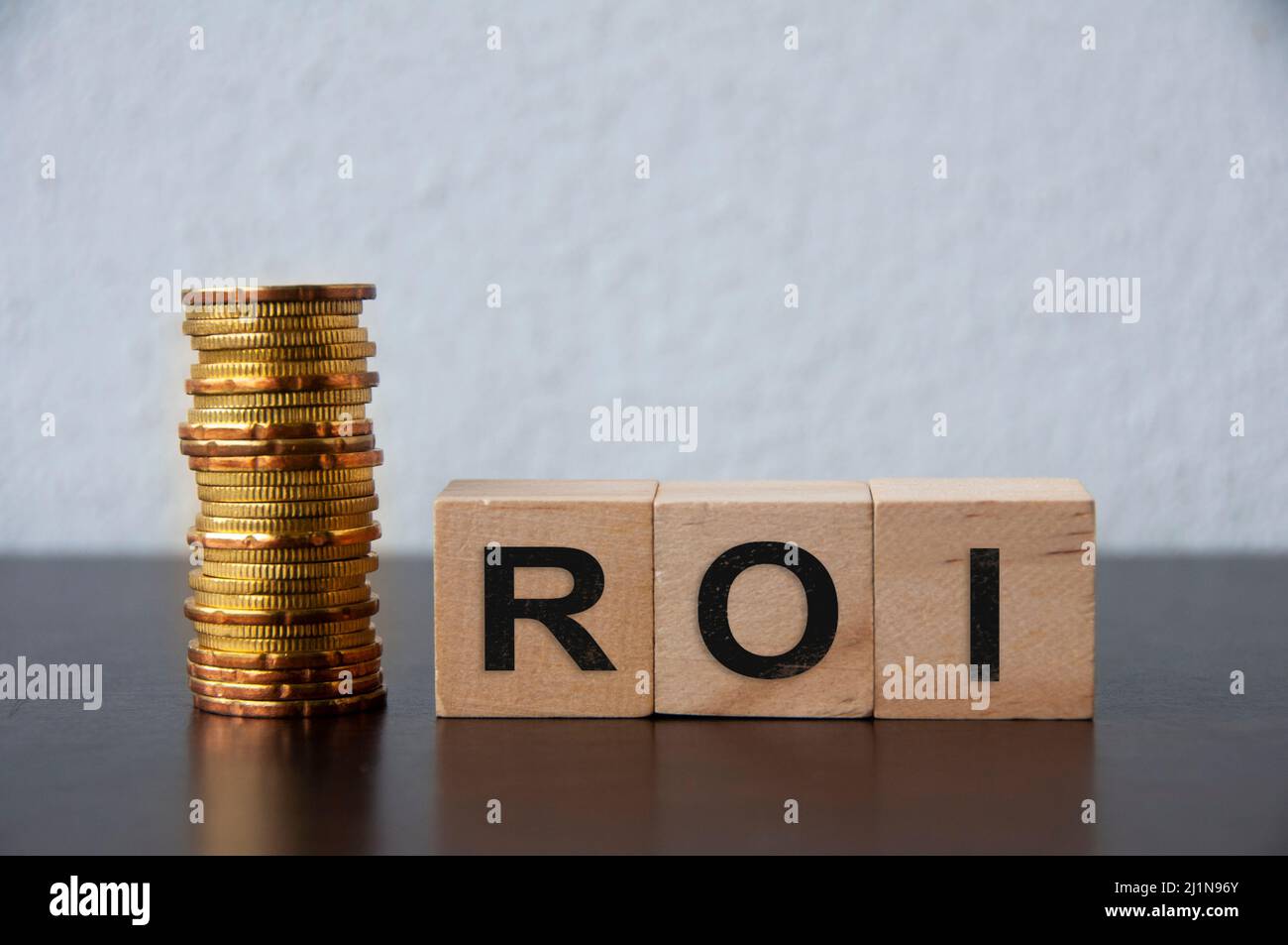 Roi return on investment coin hi-res stock photography and images - Alamy