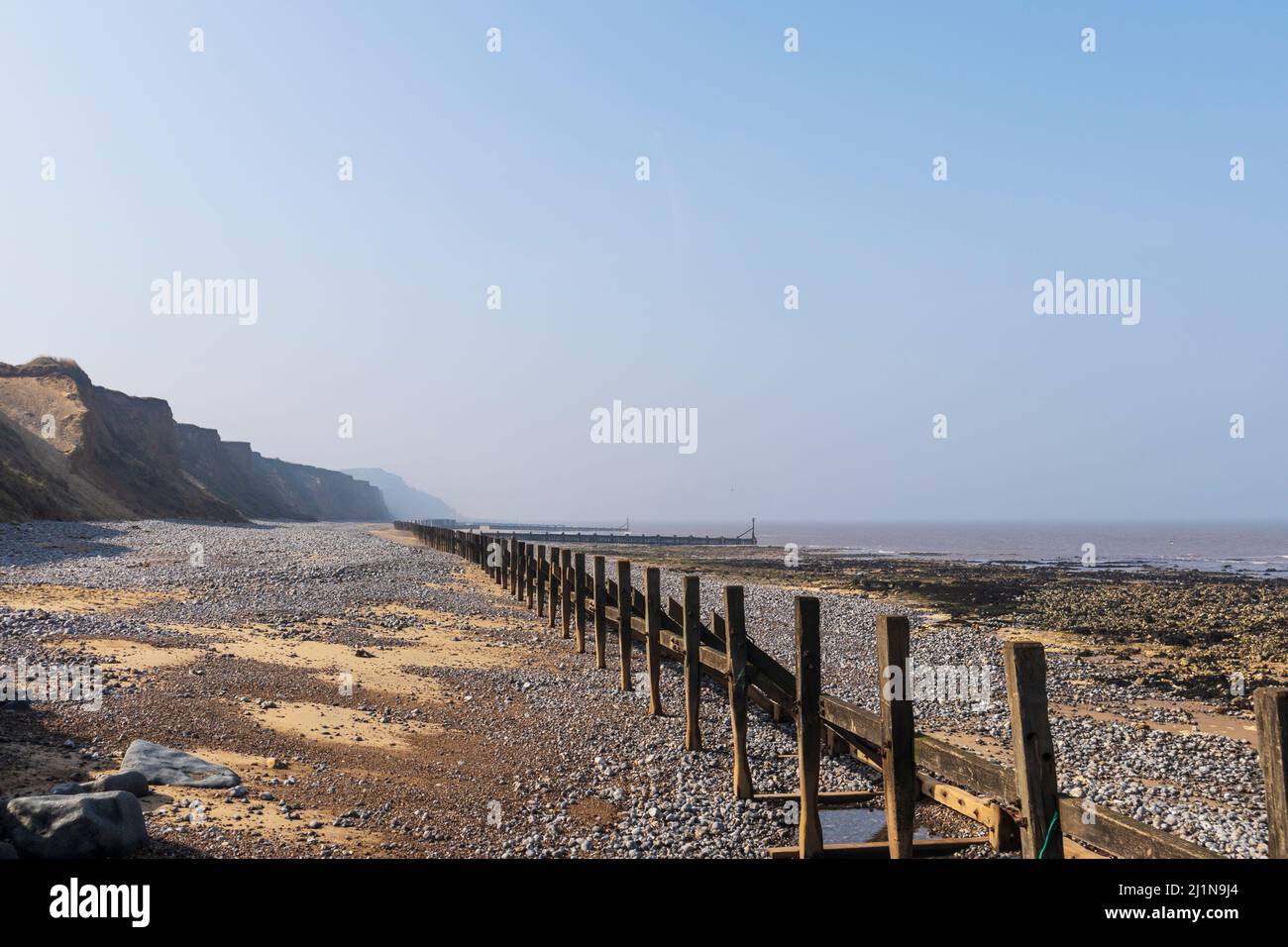 Sea Defences at West Runton on Coast of Norfolk on a Spring Day in March Stock Photo