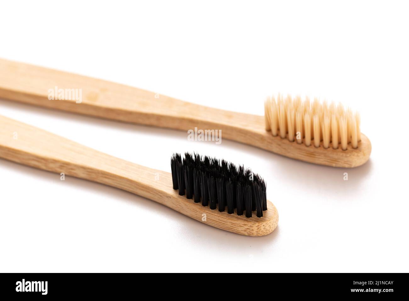 Eco-friendly bamboo toothbrushes on white background Stock Photo - Alamy