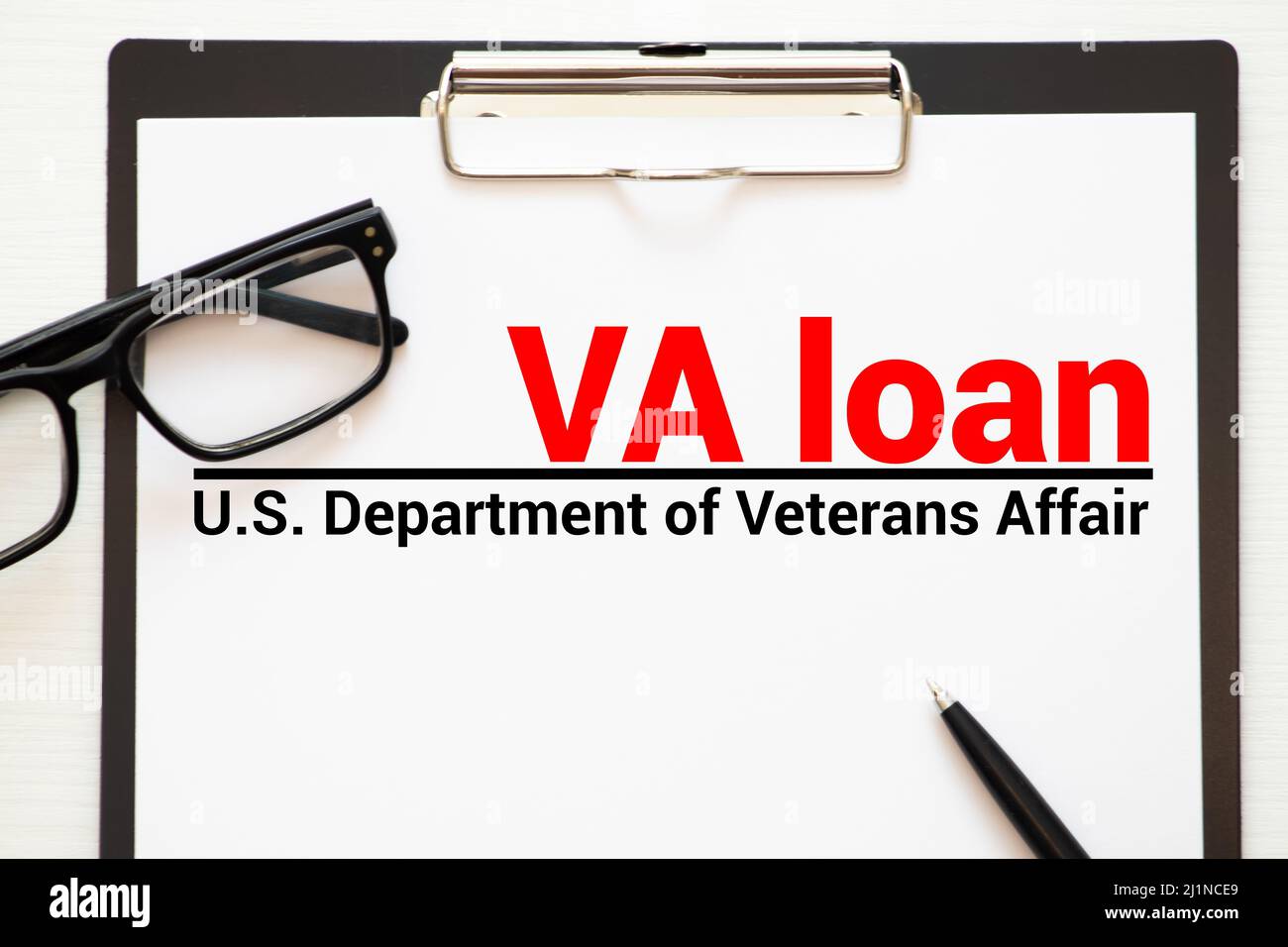 Paper with words va loan. VA loan U.S. Department of Veterans Affair