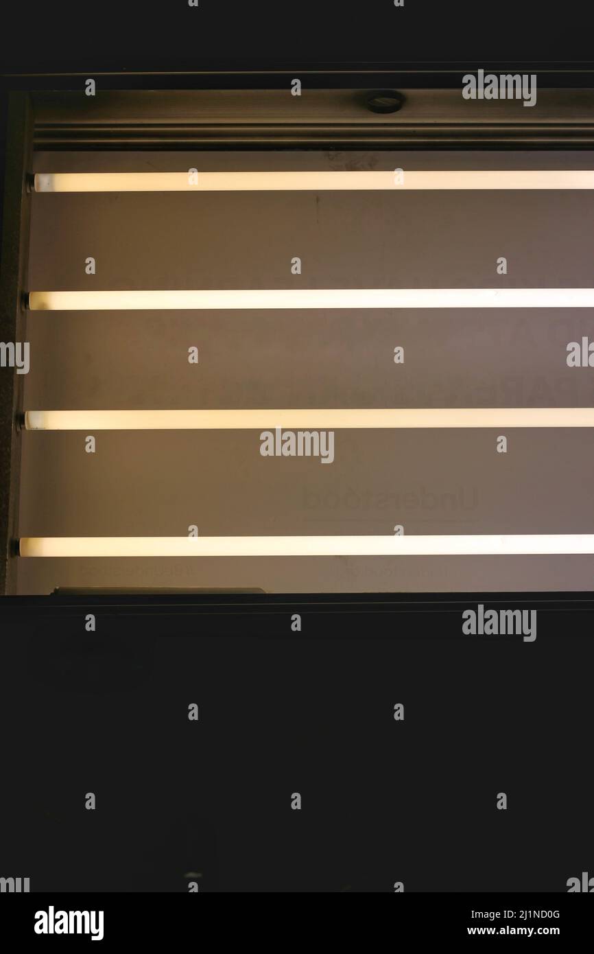 Fluorescent lights flashing a bright white light Stock Photo Alamy