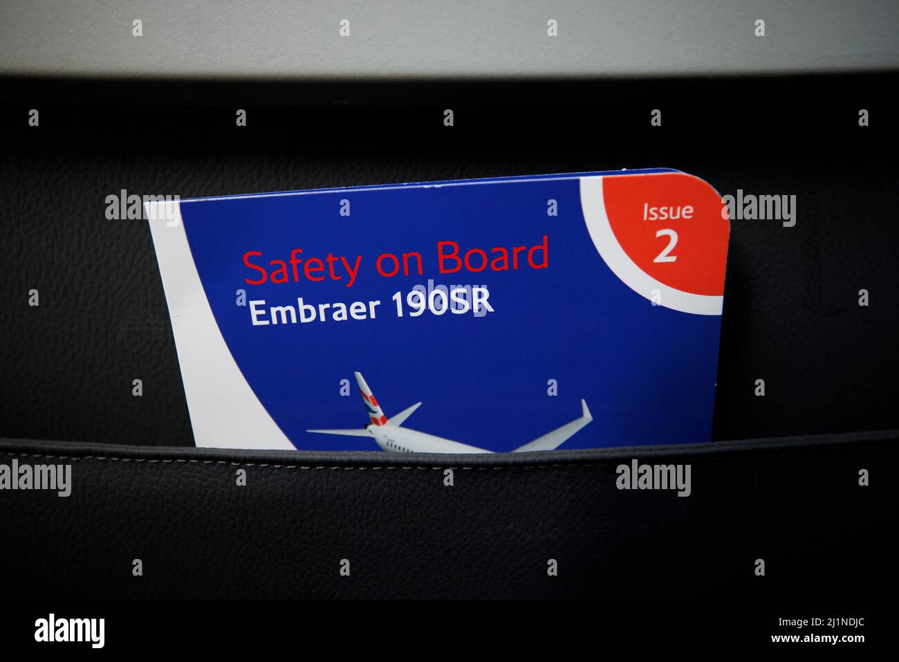 Embraer 190SR safety card in a seat pocket on a BA CityFlyer plane Stock Photo