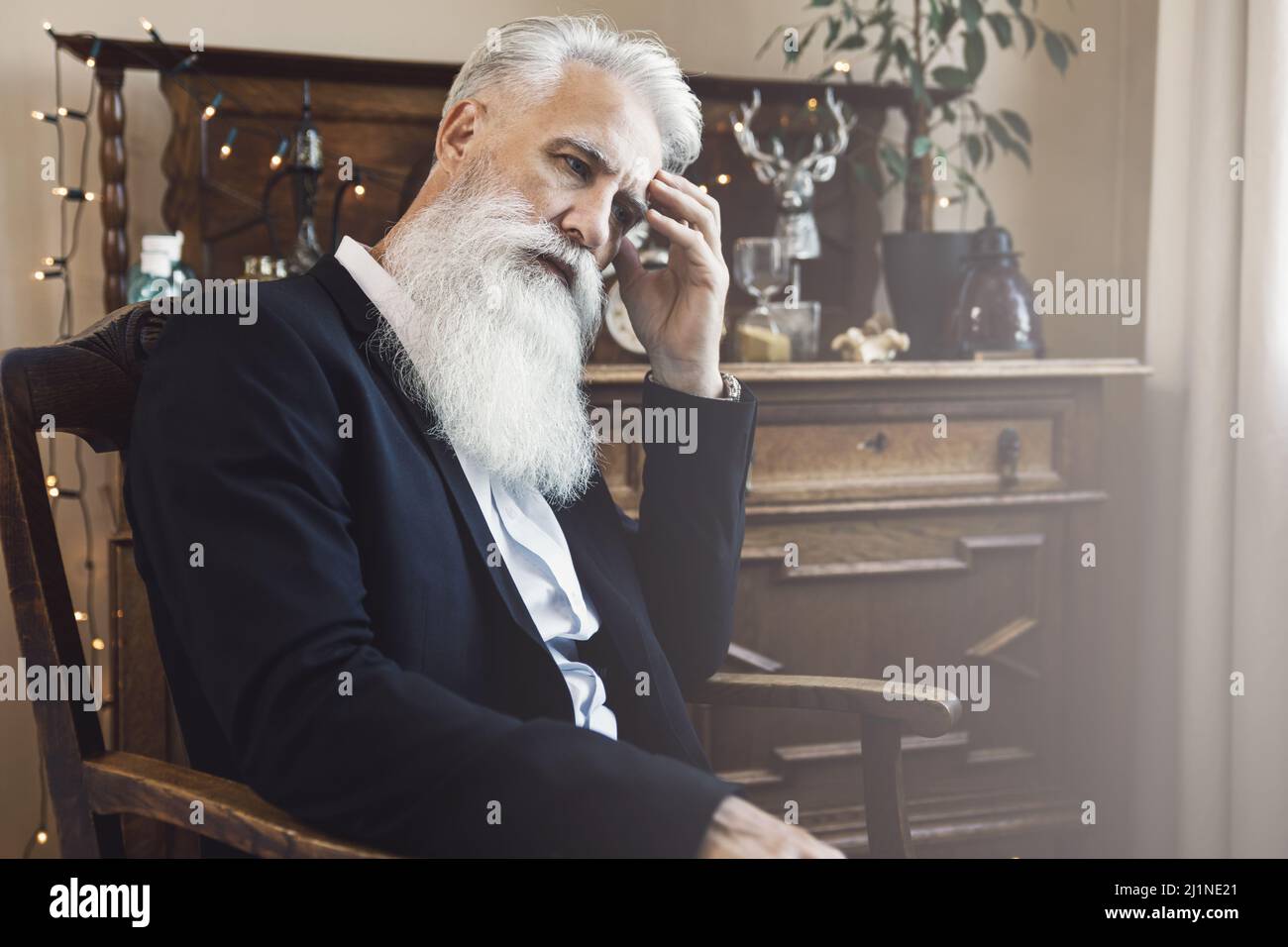 Handsome bearded senior man posing in studio Stock Photo