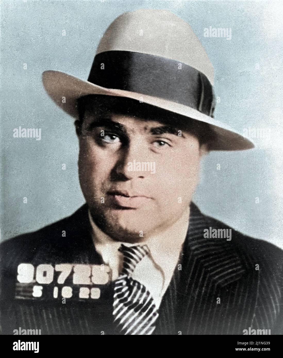 Mug shot of Al Capone in Philadelphia, Pennsylvania, where he had been arrested and charged with carrying a concealed weapon. 16 May 1929. Colorized. Stock Photo