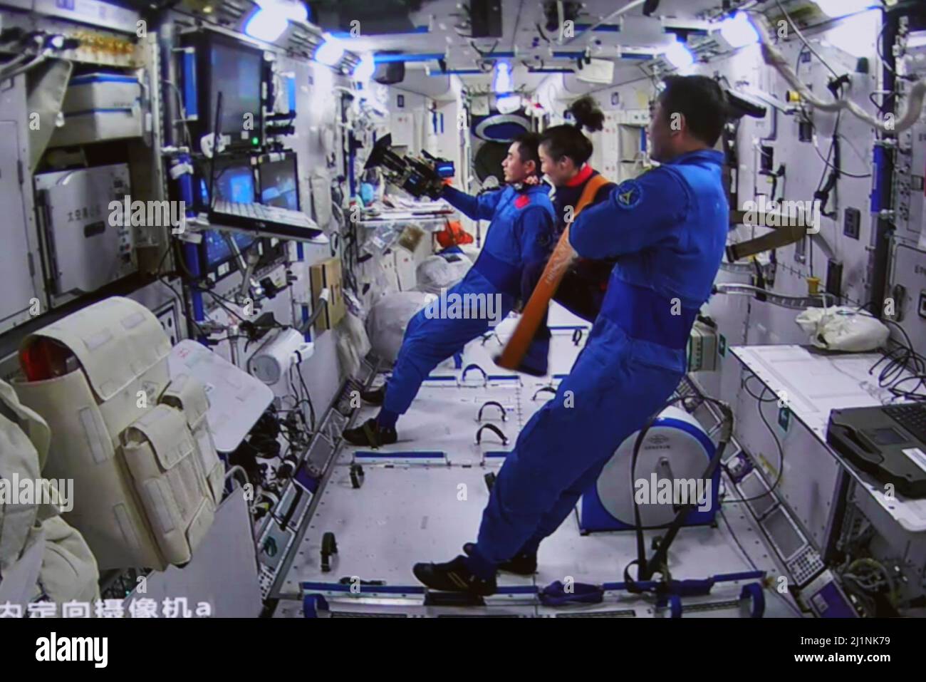 Beijing, China. 27th Mar, 2022. Screen image taken at Beijing Aerospace Control Center on March 27, 2022 shows the Shenzhou-13 astronauts watching the Tianzhou-2 cargo spacecraft leaving the core module of China's Tiangong space station. China's cargo spacecraft Tianzhou-2 separated from the core module of the country's space station Sunday afternoon, announced the China Manned Space Agency. At 3:59 p.m. Beijing Time, Tianzhou-2 left the core module of the Tiangong space station after completing all of its scheduled tasks, said the agency. Credit: Guo Zhongzheng/Xinhua/Alamy Live News Stock Photo