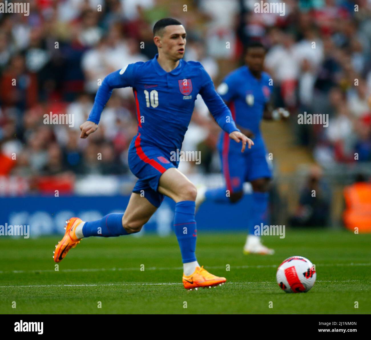 LONDON, ENGLAND - MARCH 26: Phil Foden (Man City) of England in action during An Alzheimer's Society International between England and Switzerland at Stock Photo