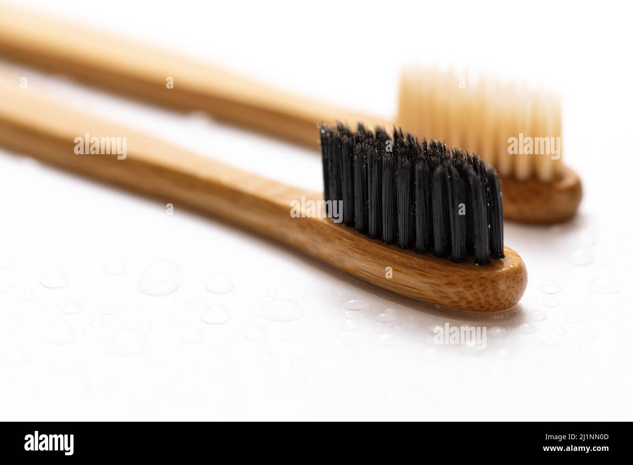 Eco friendly bamboo toothbrushes on white background Stock Photo - Alamy