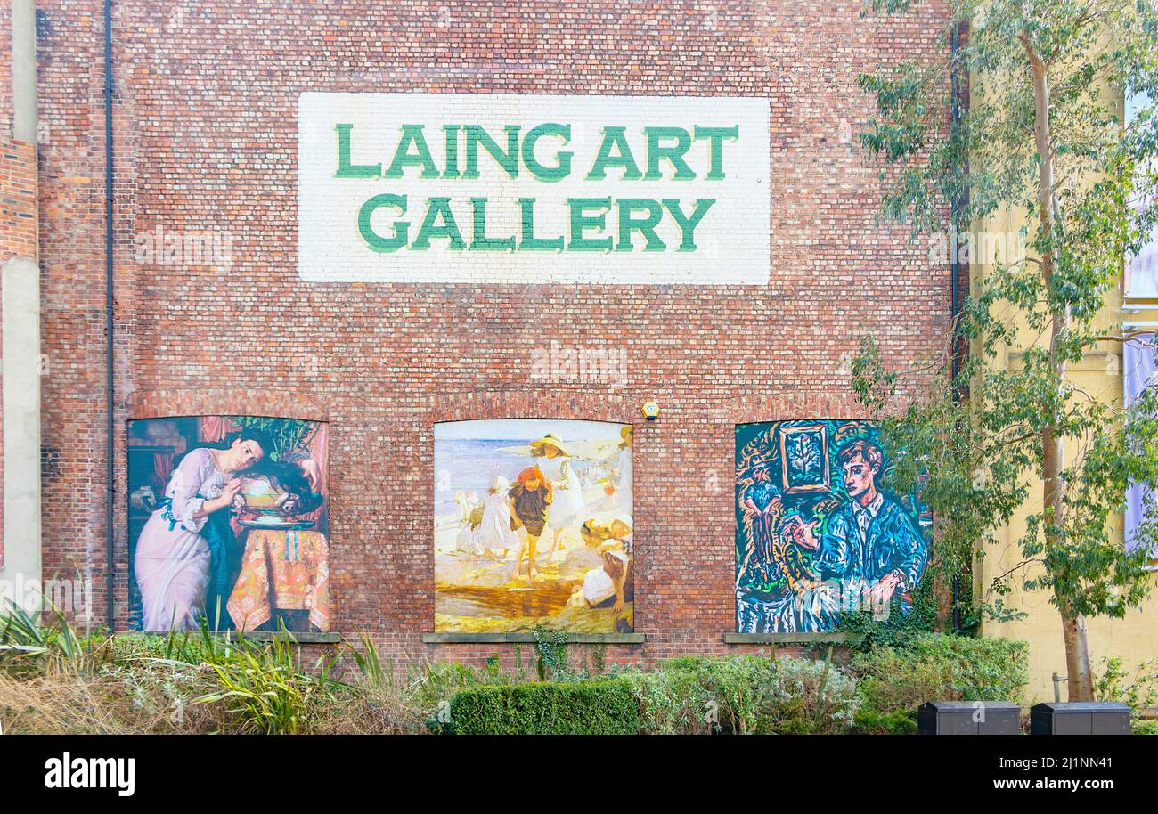 Laing art gallery exterior brick wall featuring reproductions of famous paintings in Newcastle upon Tyne UK Stock Photo
