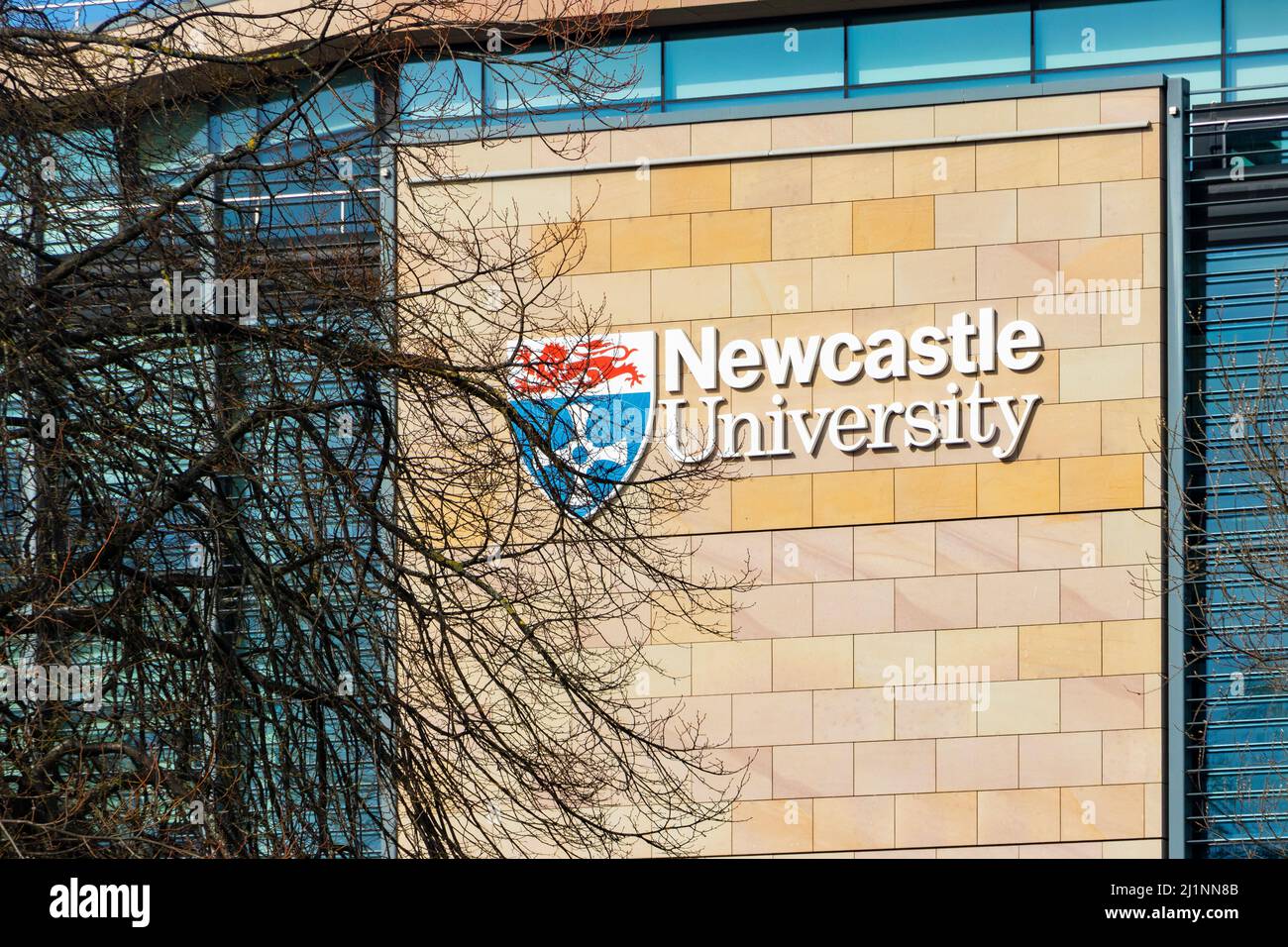 Newcastle University shield and lettering sign on building in Newcastle ...