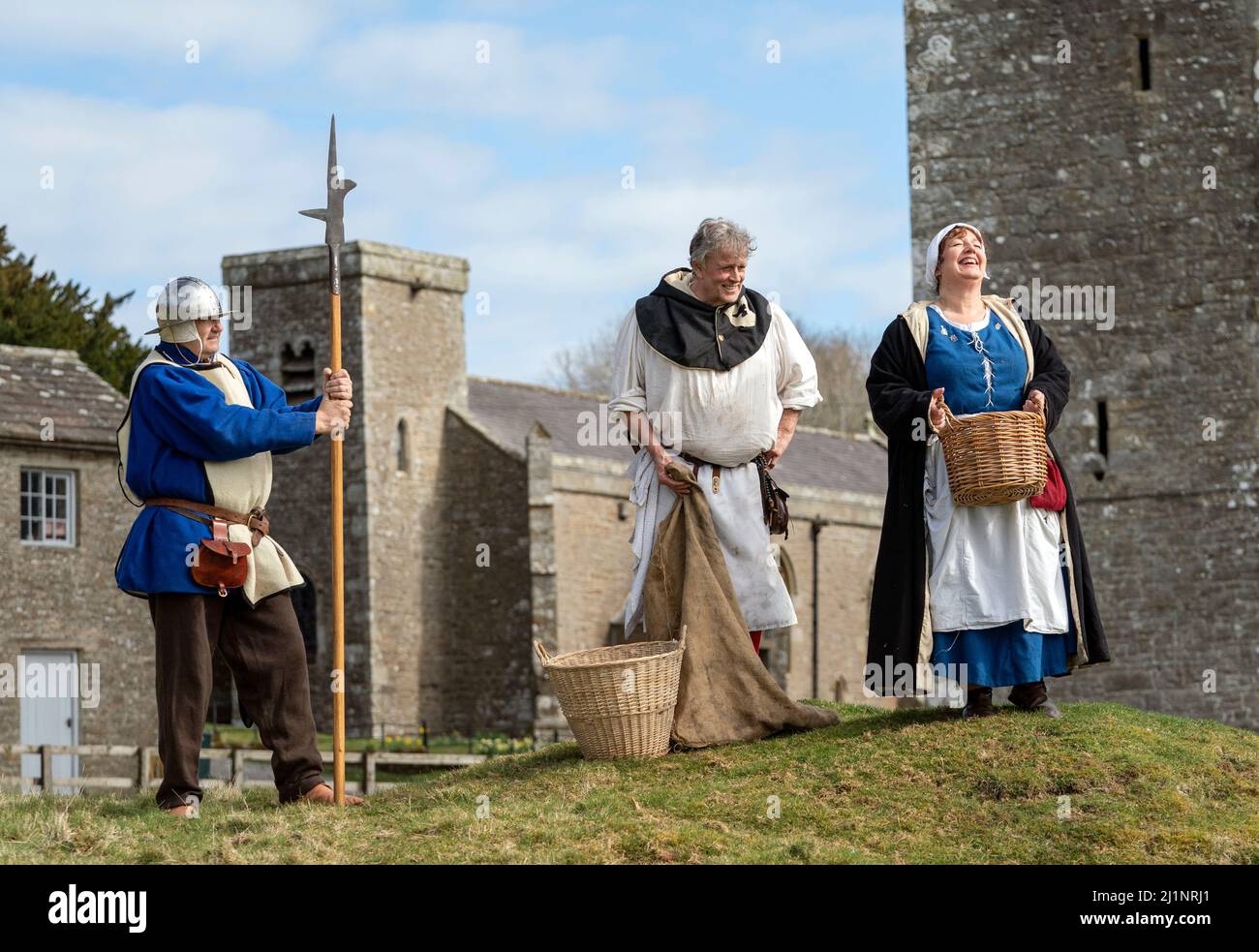 15th century re-enactors in the grounds of Bolton Castle near to Leyburn in North Yorkshire, watch as re-enactors bring alive the story of the Battle of Towton, which took place on March 29th, 1461 at a small village near to York called Towton. Picture date: Sunday March 27, 2022. Stock Photo