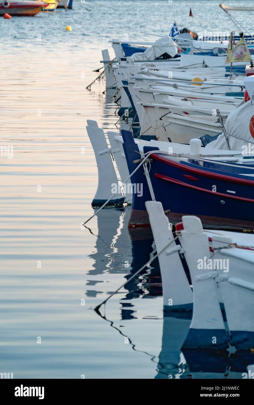 Red blue and white fishing boats hi-res stock photography and images ...