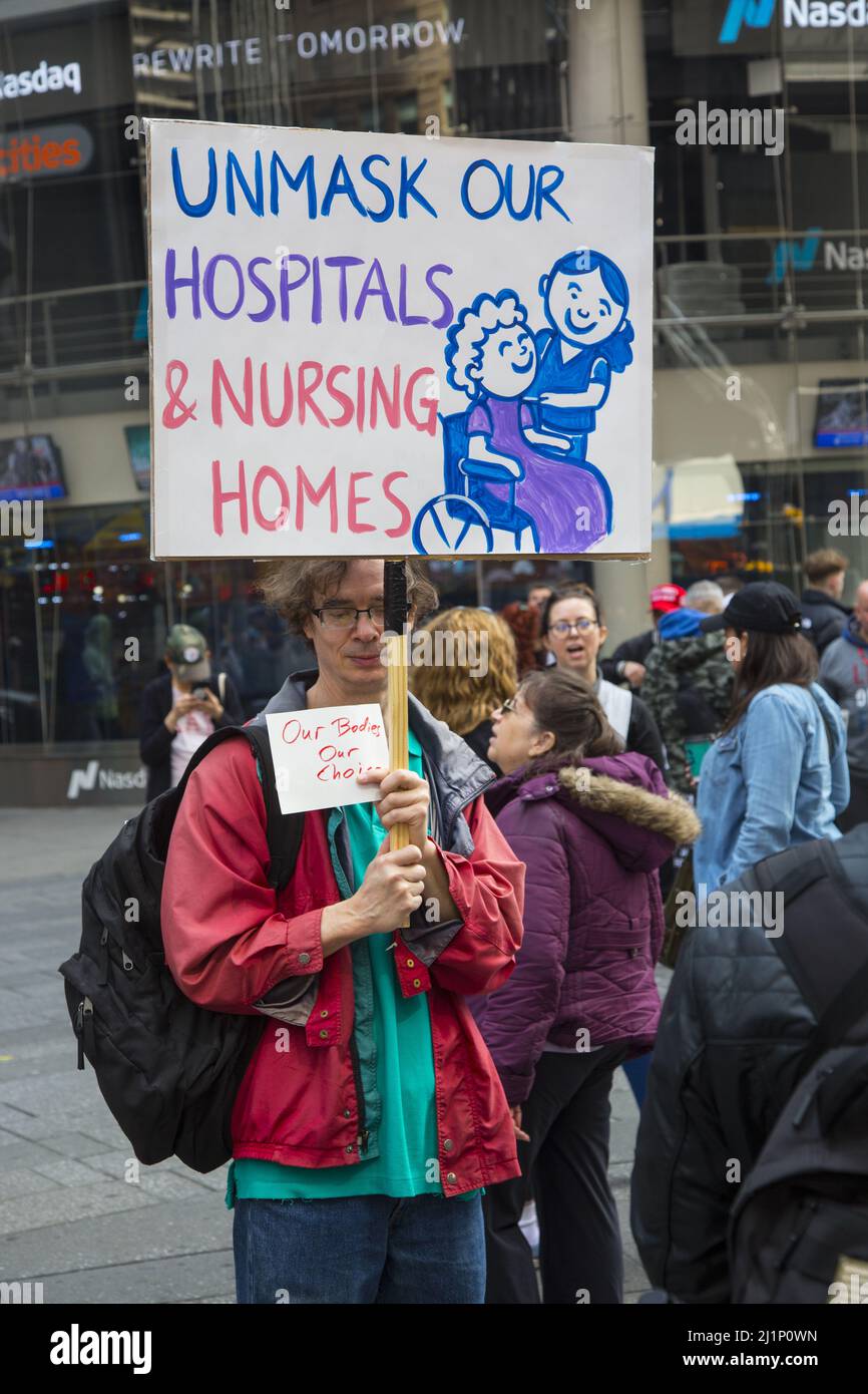 Energetic people in the 'Medical Freedom, No Vaccine Mandate' movement rally and march in New York City and other cities on March 19, 2022. Stock Photo