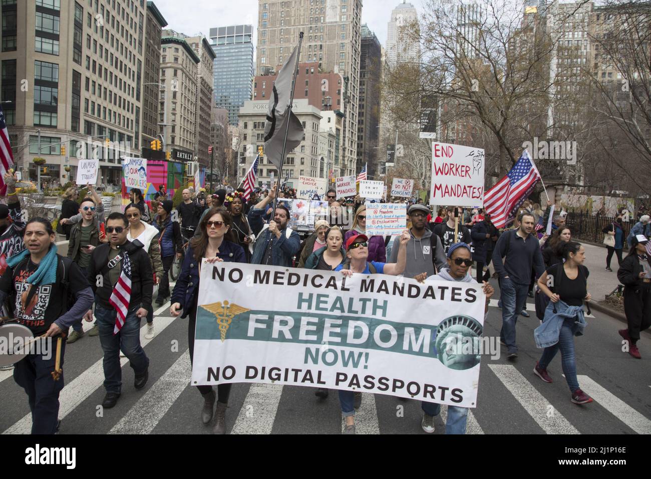 Energetic people in the 'Medical Freedom, No Vaccine Mandate' movement rally and march in New York City and other cities on March 19, 2022. Stock Photo