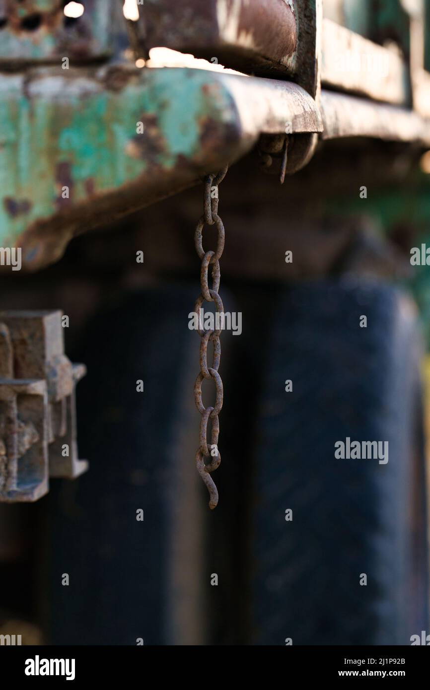 Old Rusted Chain On Tractor Trailer Stock Photo