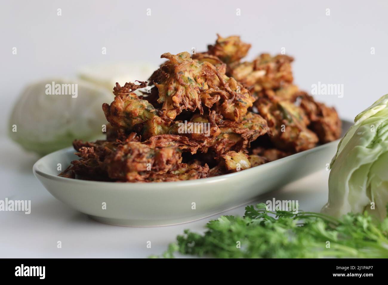 Indian cabbage fritters. Made with shredded cabbage, chickpea flour