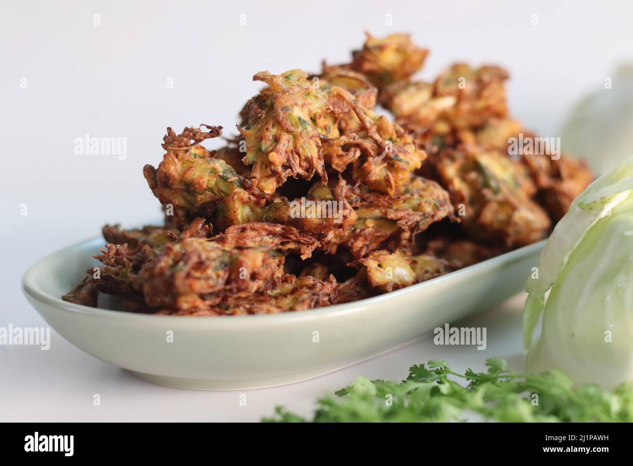 Indian cabbage fritters. Made with shredded cabbage, chickpea flour