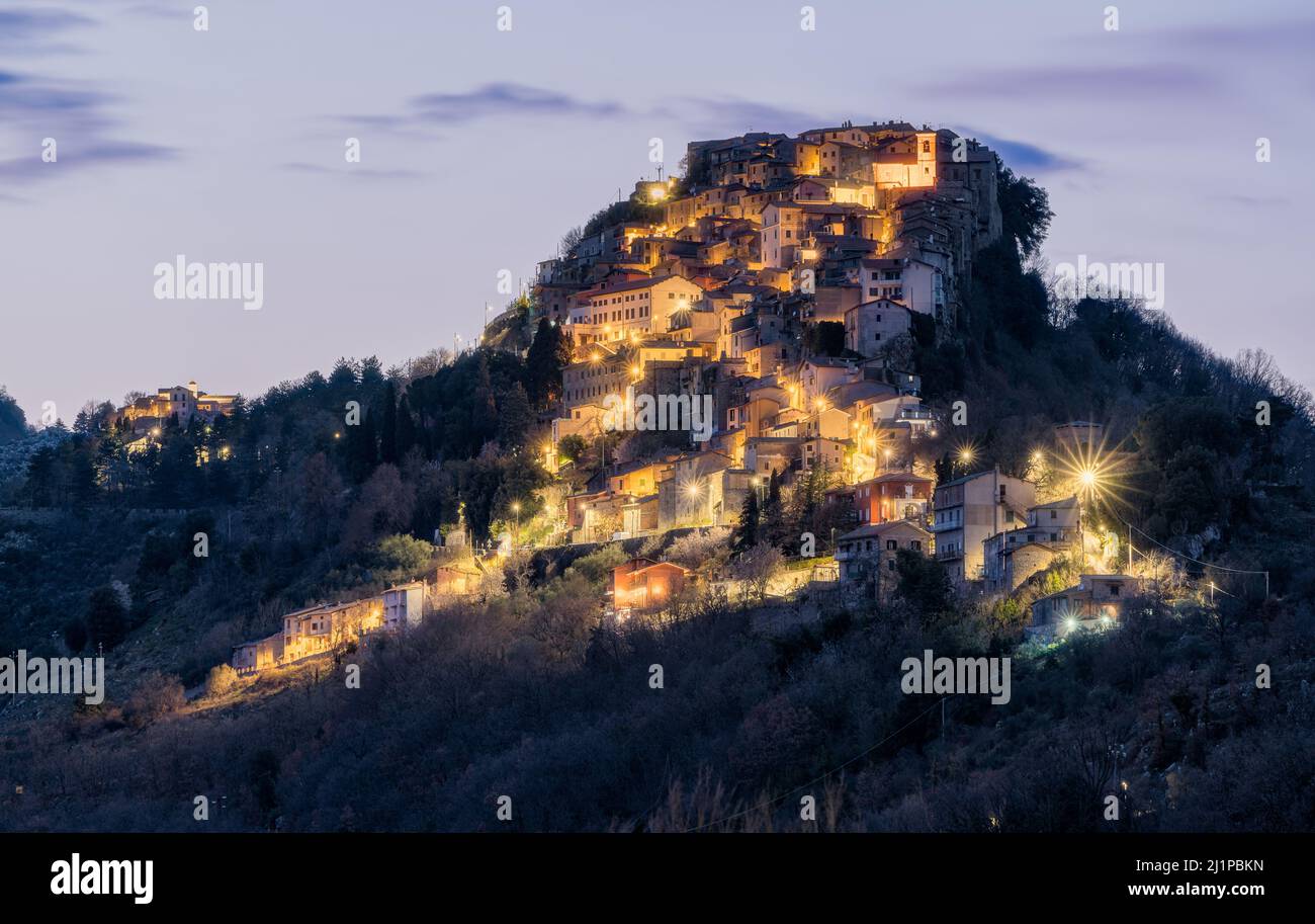 The scenographic village of Rocca Canterano illuminated in the evening, in the Province of Rome, Lazio, central Italy. Stock Photo