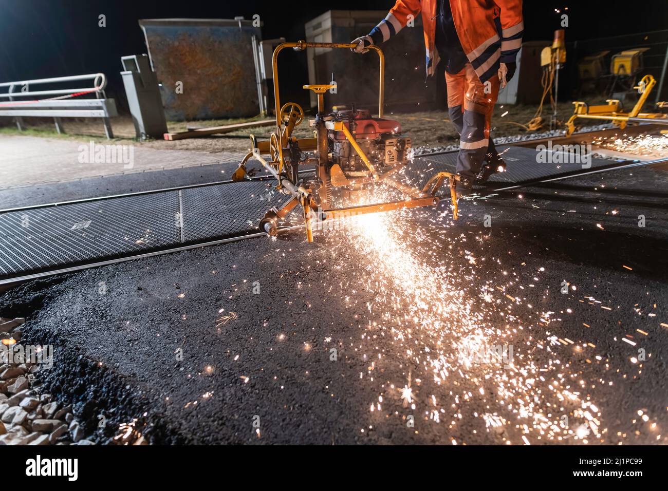 A track layer rides with a rail grinding machine Stock Photo Alamy