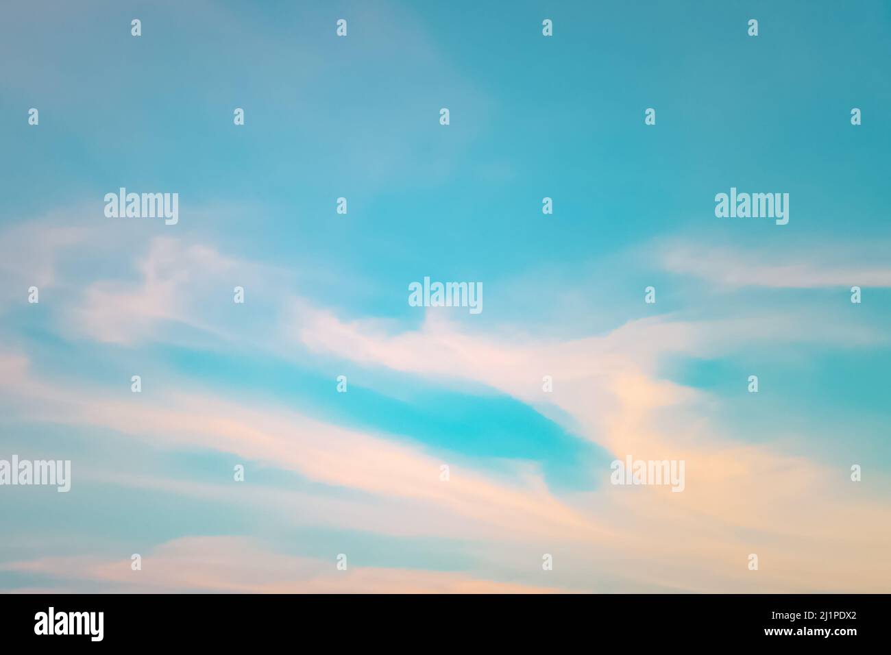 Pastel soft color sky cloudscape light sunrise blue fluffy wispy nobody empty Stock Photo